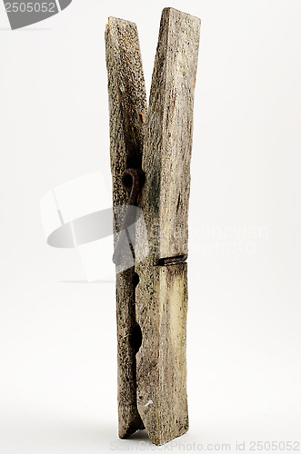 Image of dirty old wooden clothespin 