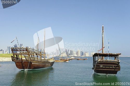 Image of Historic dhows and doha skyline