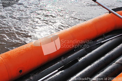 Image of empty inflatable raft on the water