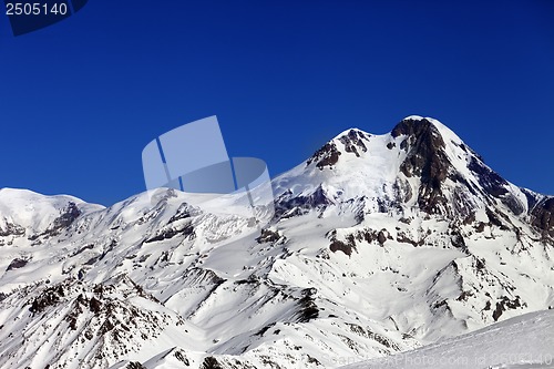 Image of Mount Kazbek at sun winter day