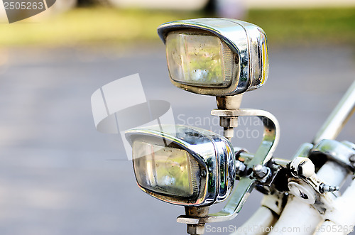 Image of two old vintage bicycle lights