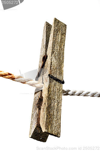 Image of old wooden clothes peg