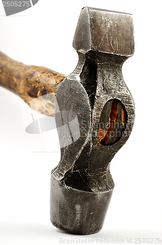 Image of old hammer with a wooden handle