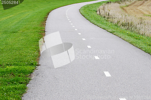 Image of empty asphalt bike path 
