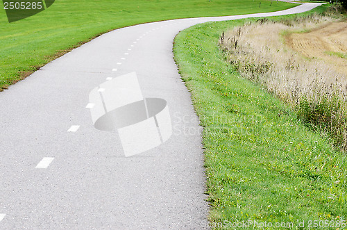 Image of empty asphalt bike path 