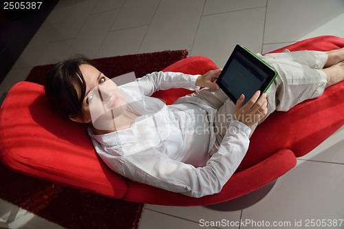 Image of woman using tablet pc