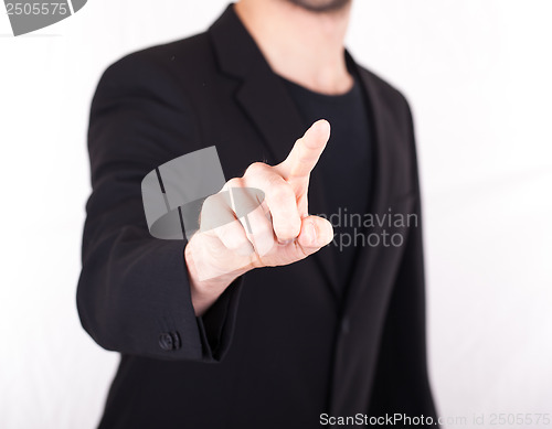 Image of Businessman pressing an imaginary button