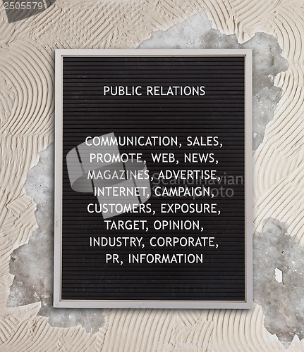 Image of Public relations concept in plastic letters on very old menu boa