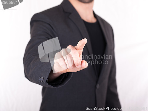 Image of Businessman pressing an imaginary button