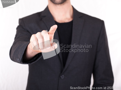 Image of Businessman pressing an imaginary button