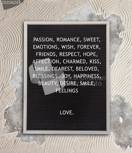 Image of Love concept in plastic letters on very old menu board