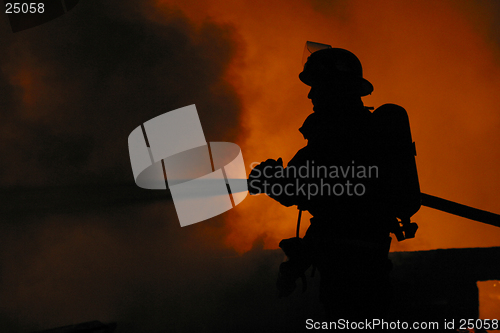 Image of firefighter in silhouette