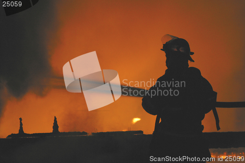 Image of firefighter in silhouette