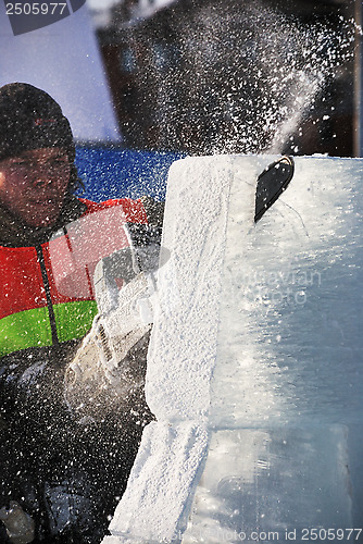 Image of PETROZAVODSK, RUSSIA ? FEBRUARY 15: artist is cutting iceblock w