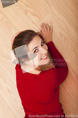 Image of Woman lying on the floor