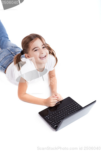 Image of Little student girl with a laptop