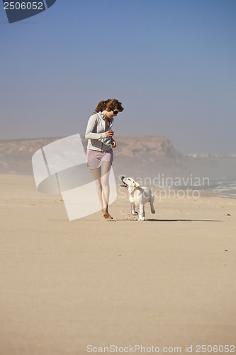 Image of Girl with her cute dog