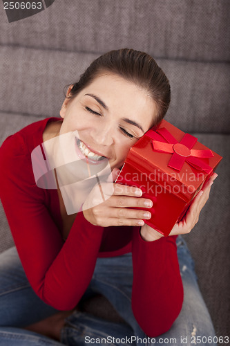 Image of Woman very happy with the present