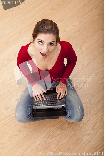 Image of Woman working with a laptop