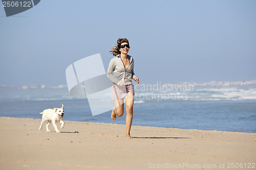 Image of Girl with her cute dog