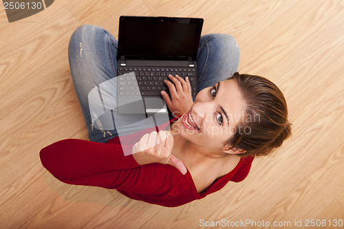 Image of Woman working with a laptop