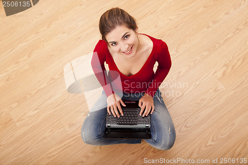 Image of Woman working with a laptop
