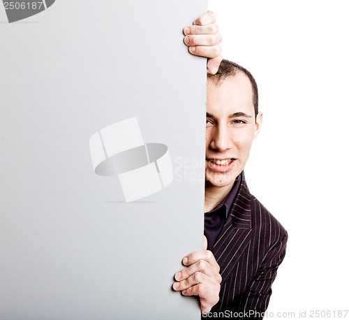 Image of Businessman showing something