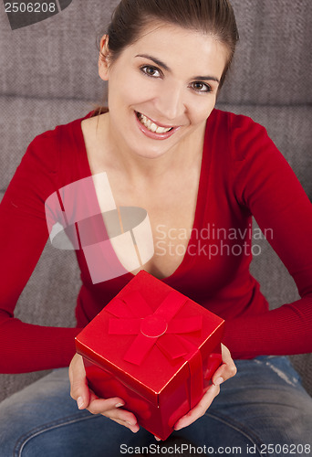 Image of Woman with a christmas present