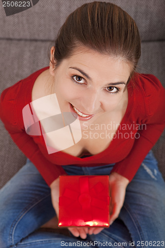 Image of Woman with a christmas present