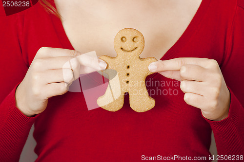 Image of Holding a Gingerbread cookie
