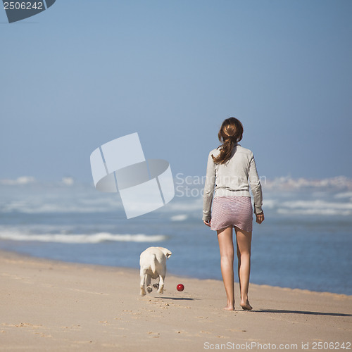 Image of Walking with her dog