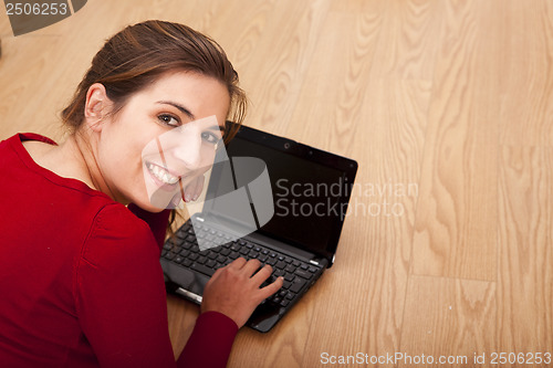 Image of Woman working with a laptop