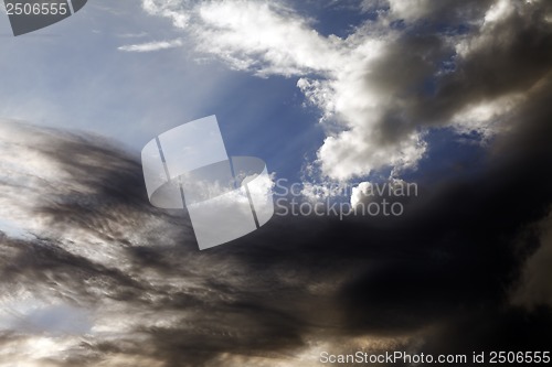 Image of Sky with clouds at summer sunset