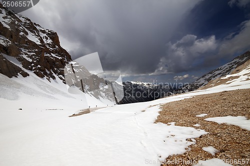 Image of Group of hikers in snowy mountains