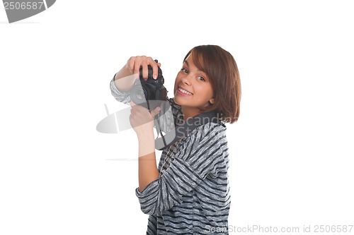 Image of Lovely teenage girl with photo camera