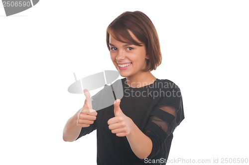 Image of Teenage girl showing thumbs up and smiling