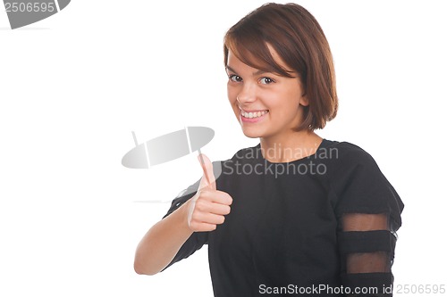 Image of Teenage girl showing thumbs up and smiling