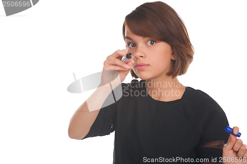 Image of Girl touching virtual screen with marker