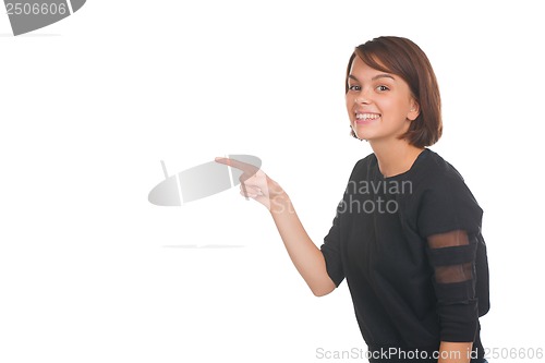 Image of Girl pointing at something and smiling