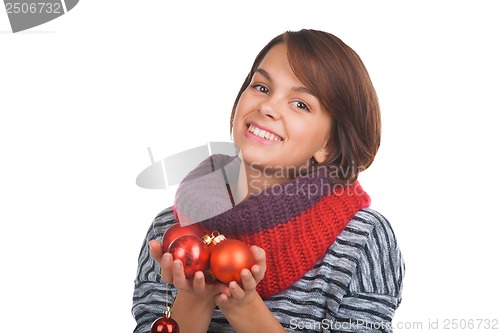 Image of Young woman with christmas ball