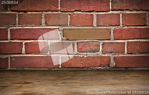 Image of old brick wall and wooden flor