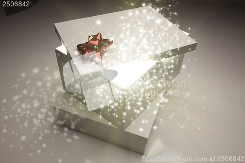 Image of Christmas Presents With Something Bright and Magical Coming From