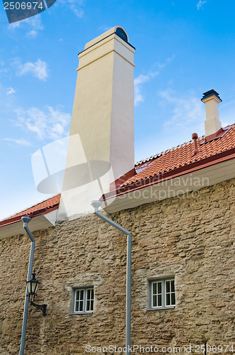 Image of Facade of an ancient building with the big chimney in Tallinn