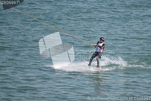 Image of the athlete of water skiing on a water ski