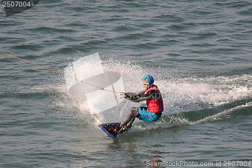 Image of the athlete of water skiing on a water ski