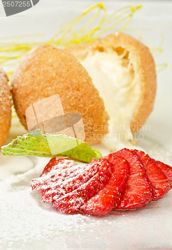 Image of Dessert of ice-cream at biscuit
