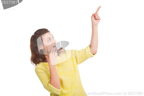 Image of Young woman pointing at something