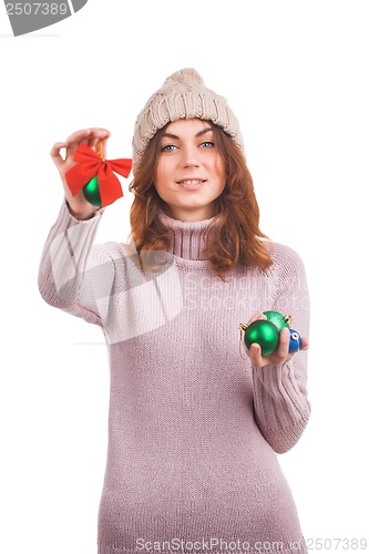 Image of Young woman with christmas ball