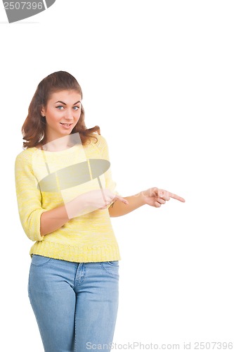 Image of Young woman pointing at something