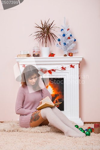 Image of Hot girl at home in Christmas time